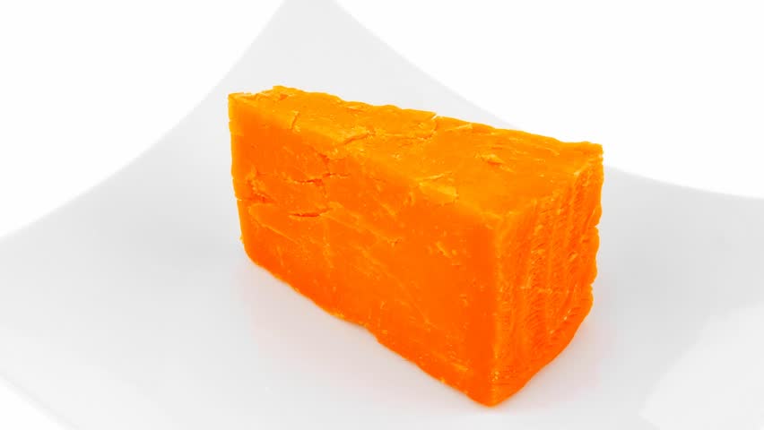 french gourmet dark cheddar cheese served on a ceramic plate 1920x1080 intro motion slow hidef hd