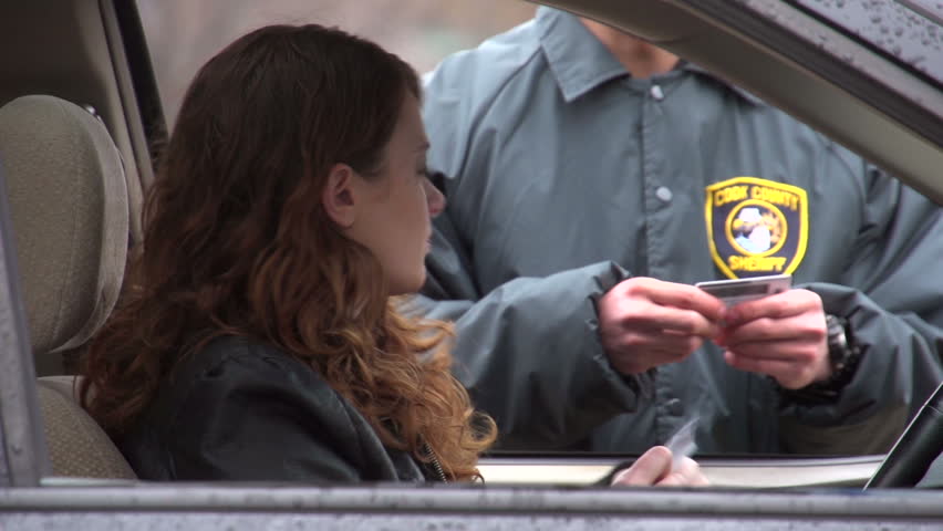 Young woman being passive aggressive with law enforcement