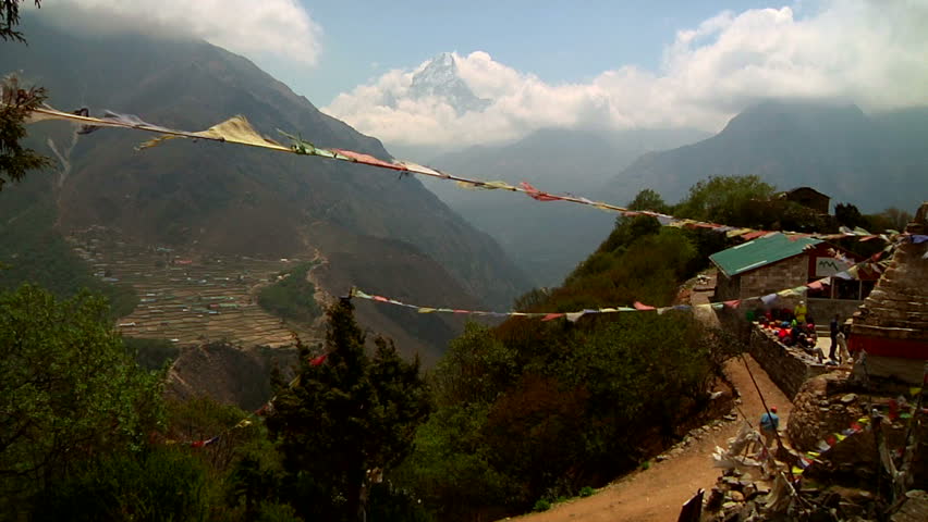 The summit of Ama Dablam and the traditional Sherpa village of Phortse, on the way to Mt. Everest Base Camp. 
