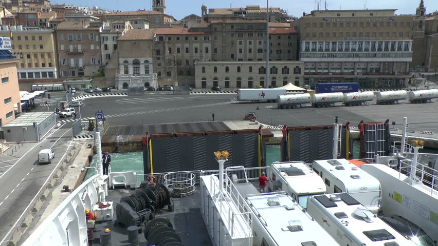 ANCONA,ITALY - APRIL 25 2013 : A Ferry leaving it's berth in the port viewed from the ferry on April 25 2013 in Ancona Italy
