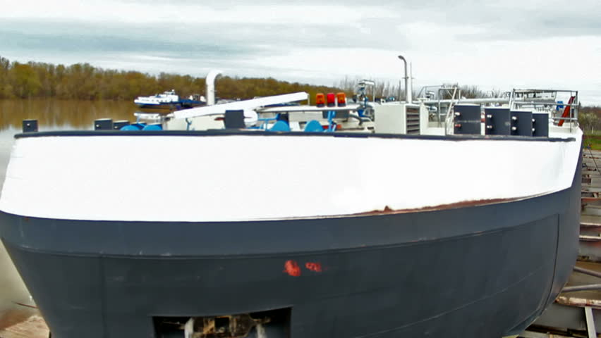 look from heights onto the deck of a large tanker in shipyard,video clip ; Deck great ship