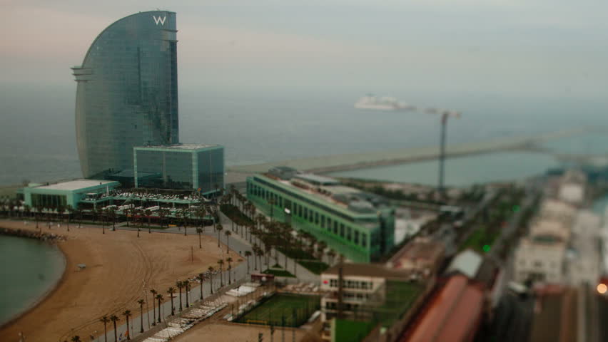 BARCELONA- MAY 12: Timelapse shot of the W hotel, a unique glass tower on the edge of the beach. 12 May 2013, Barcelona, Spain.