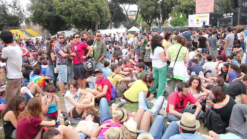ROME, ITALY - MAY 1: People during free "Concerto del Primo Maggio" ("Workers' Day Concert") in Piazza San Giovanni (San Giovanni Square) on Workers' Day, May 1, 2013 in Rome, Italy.