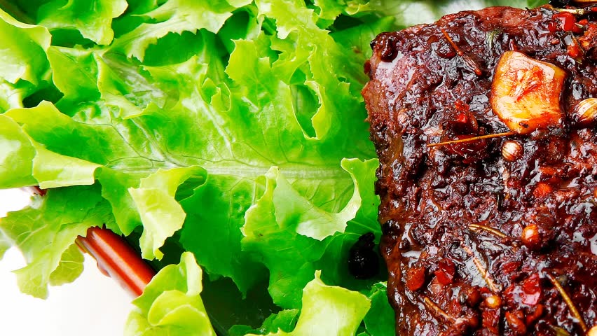 roast steak served on green salad on bowl 1920x1080 intro motion slow hidef hd