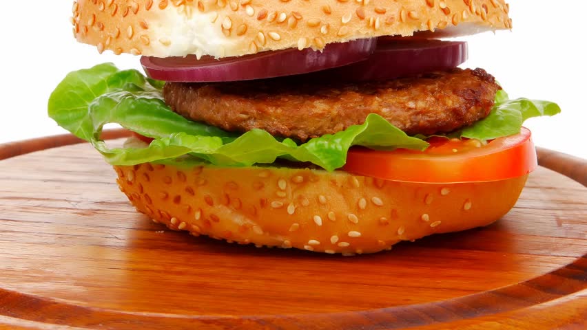 big double grilled hamburger on wooden plate 1080p 1920x1080 intro motion slow hidef hd
