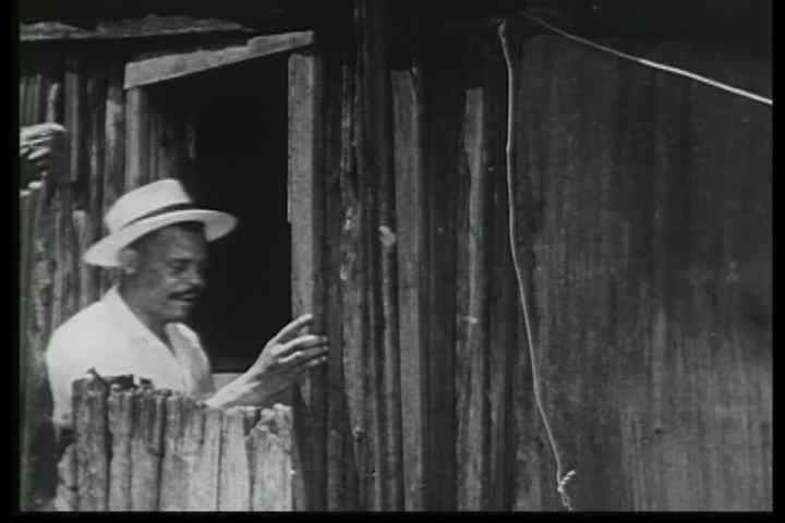 1950s - Tenants and Landlords both make appearances at the housing court. Before & after of backyards and alleyways are shown.
