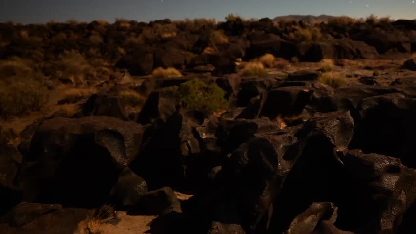 Astrophotography Time Lapse Moonlight on Volcanic Rock