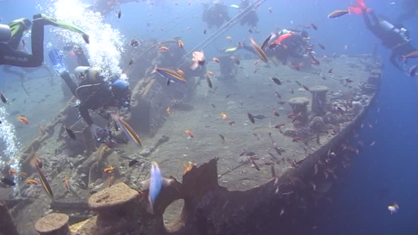 Divers investigating a World war 2 Wreck. SS Thistlegorm.Red Sea. Captured on a 3CCD DVCAM Camera 16:9 anamorphic