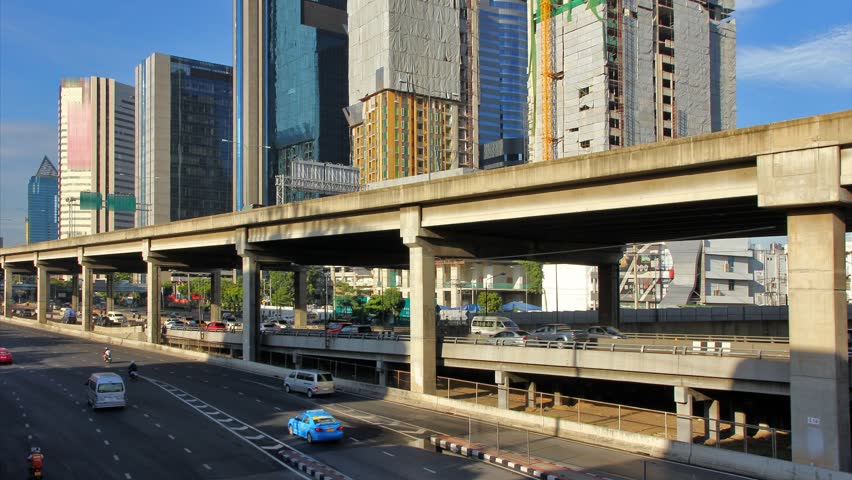Traffic in the city. There are several freeway lane.