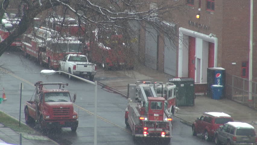 WASHINGTON DC - USA, MARCH 25, 2013, Fire fighter truck enter on fire department parking in winter time