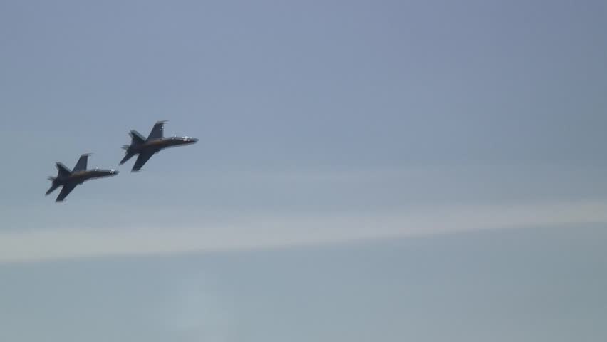 Fighter air jet performing aerobatics stunt
