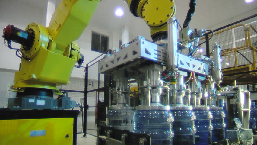 Servo-controlled robot in the bottled water factory.