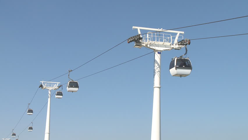 Cable car working against blue sky