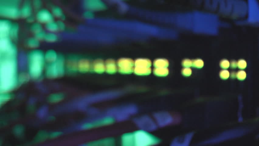Fiber optic and ethernet cables connected into media converters