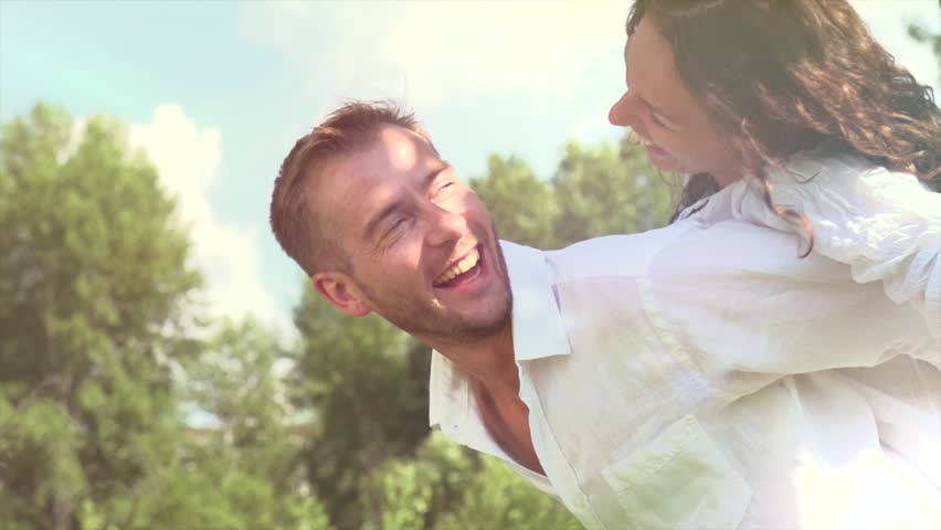 Happy Couple Having Fun Outdoors. Laughing Joyful Family. Freedom Concept.