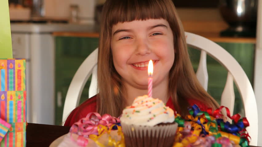 Girl and Birthday Cupcake 
