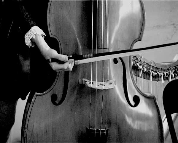 Double bass player,imitation of old movie 