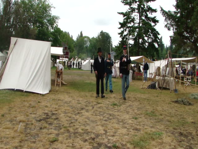 PORT GAMBLE, WA - JUN 20: Civil War reenactors participate in a scene in which President Lincoln walks through a Union camp. June 20, 2009 in Port Gamble, WA. 