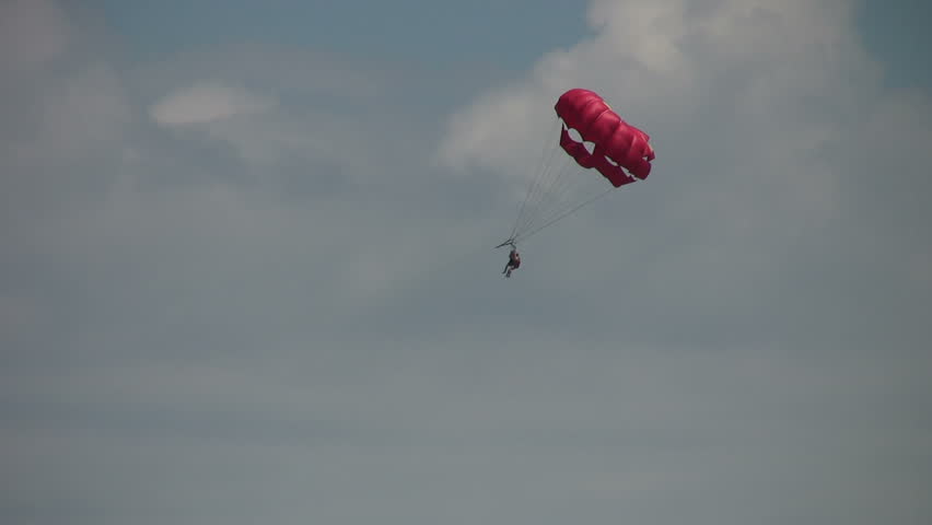 Parasail in the sky over Virginia Beach with clouds in the background