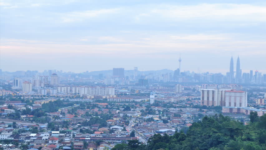 Timelapse over Kuala Lumpur City, Malaysia, from day to dusk to night.