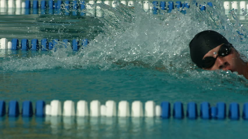Slow motion man swimming