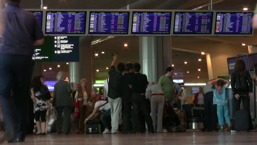 MOCSOW - JUNE 16: Passengers and monitors in departure loungein of airport Domodedovo June 16, 2009 in Moscow, Russia. Domodedovo is RussiaÃ¢â¬â¢s largest airport in terms of passenger and cargo traffic. 