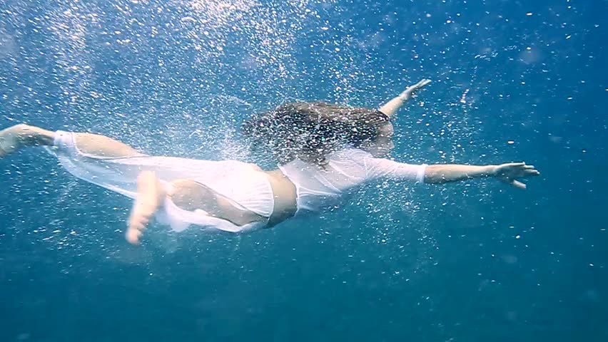 Two Young Women Swimming Underwater Together In The Ocean Stock Footage Video 5148569 Shutterstock