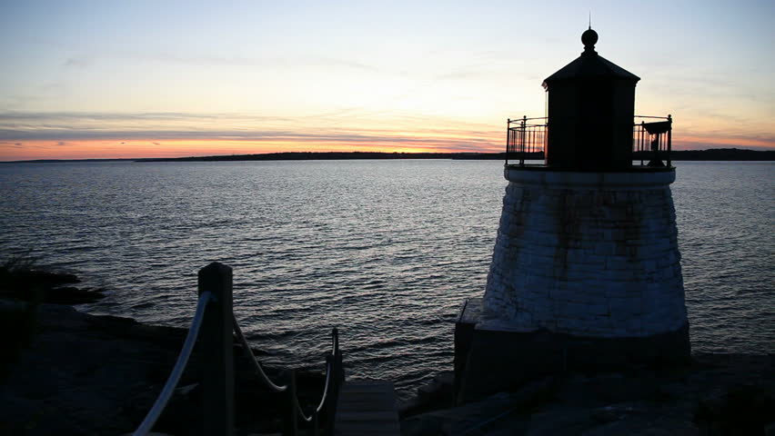 Beautiful New England lighthouse at sunset