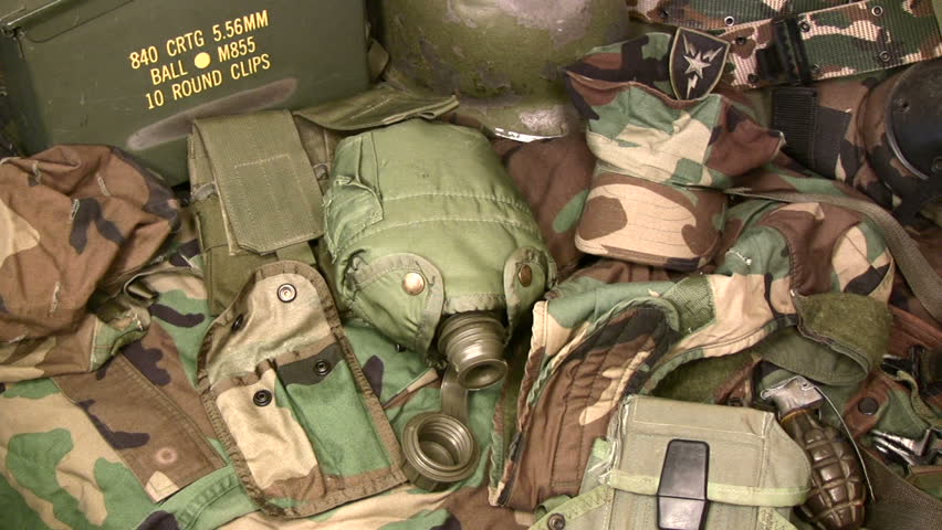 HD 1080i slow pan of army surplus gear.