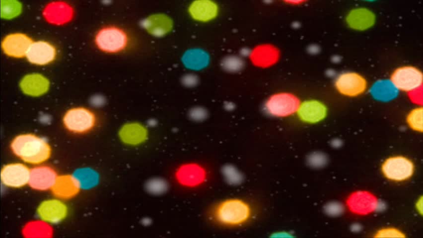 Snow falls in front of colored Christmas lights in this soft focused, ethereal seamless motion loop. HD widescreen.
