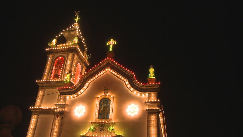 Church decorated with Christmas lamps