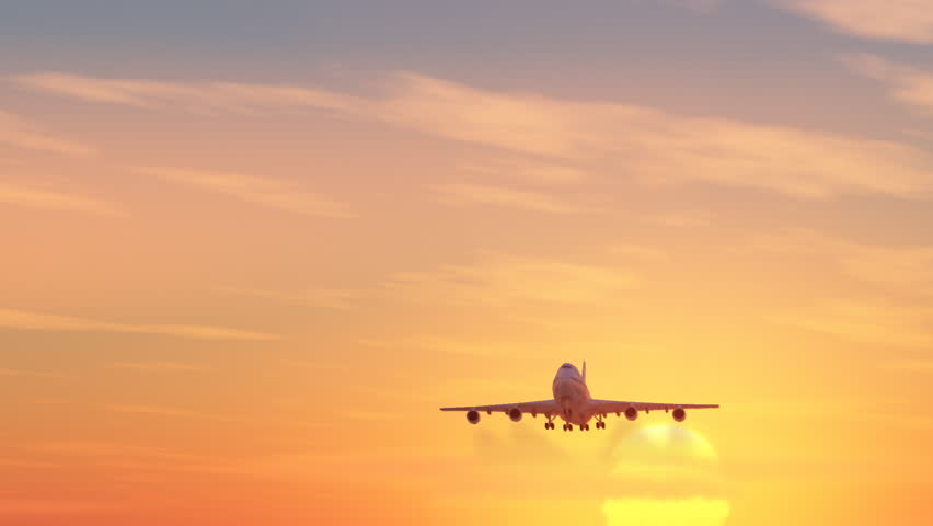 airplane fly up in sunset sky