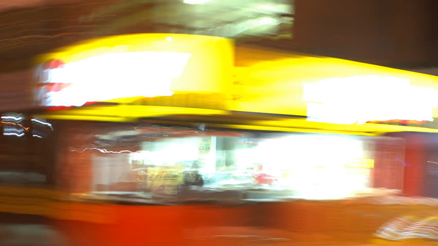 HD timelapse of thrill ride through the city. Camera pans full 360 on car roof. All logos, faces and license plates have been carefully obscured, frame by frame.