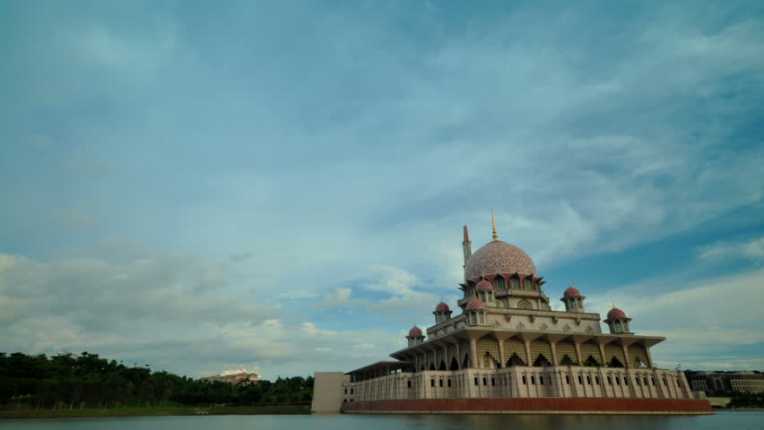 KUALA LUMPUR - JULY 18 : The Sun sets over The Putra Mosque on July 18, 2009 at Putrajaya, Kuala Lumpur, Malaysia. 