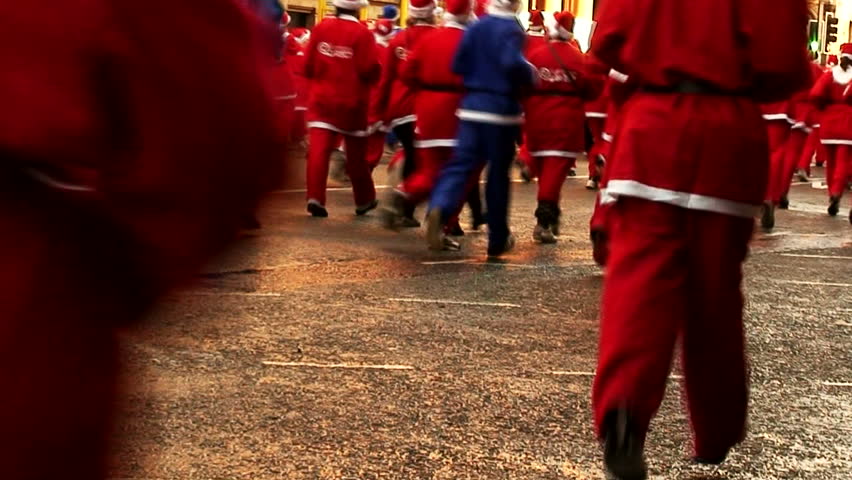 LIVERPOOL - DECEMBER 6: Thousands of runners take part in the annual "Santa Dash" for charity in December 6, 2009in Liverpool, England. 