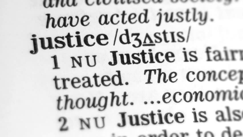 Dictionary Definition - Justice. Selective focus on the word. 