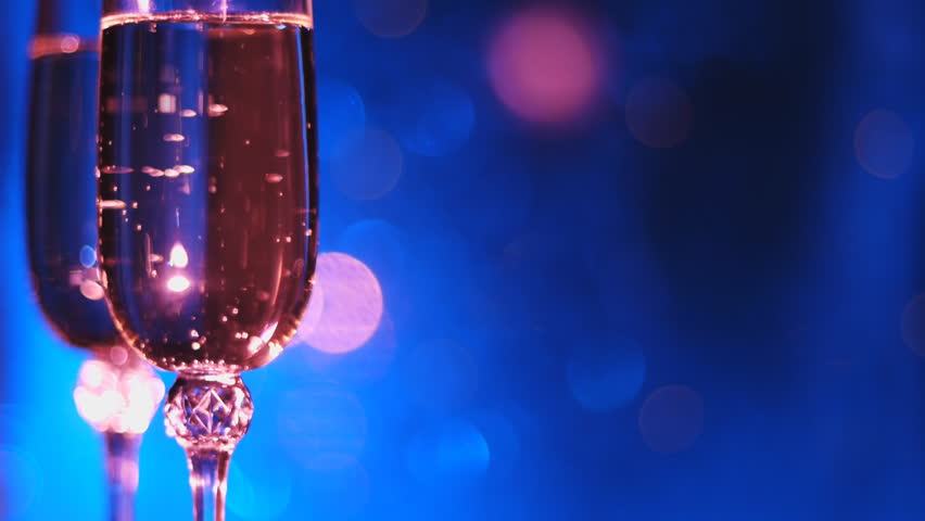 Perfect seamless loop festive background. Wine glass and light garland.
