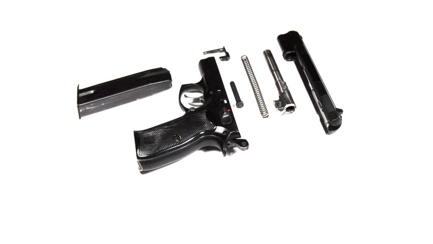 real 3D rotating dismantled pistol isolated on white