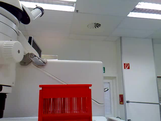 The operator loads the carrier with silicon wafer into measuring station