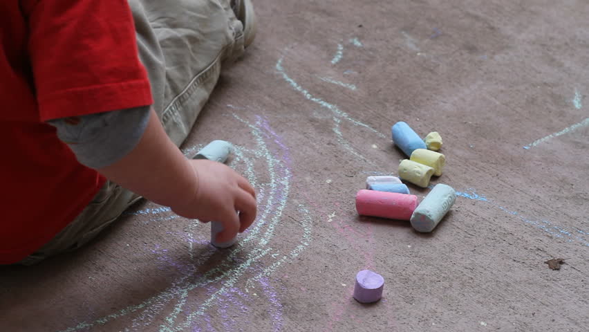 Child Drawing with Sidewalk Chalk