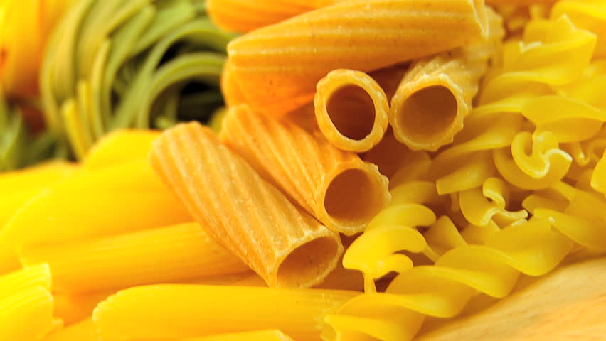 Selection of fresh vegetables, salad ingredients, pasta & olive oil to make healthy lifestyle meals