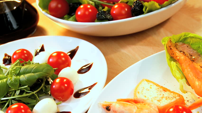 Healthy selection of crisp salad vegetables & fresh seafood making a healthy nutritious meal