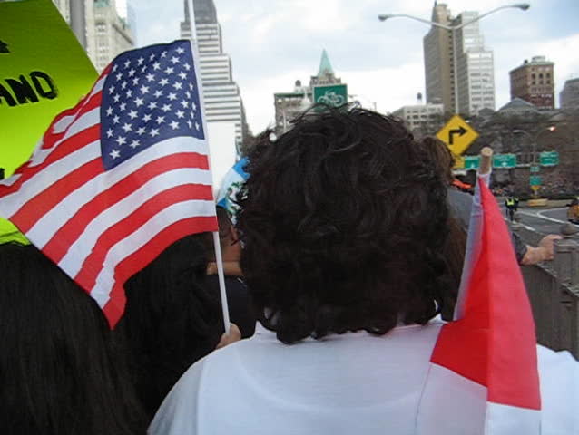 immigrants marching brooklyn bridge, nyc