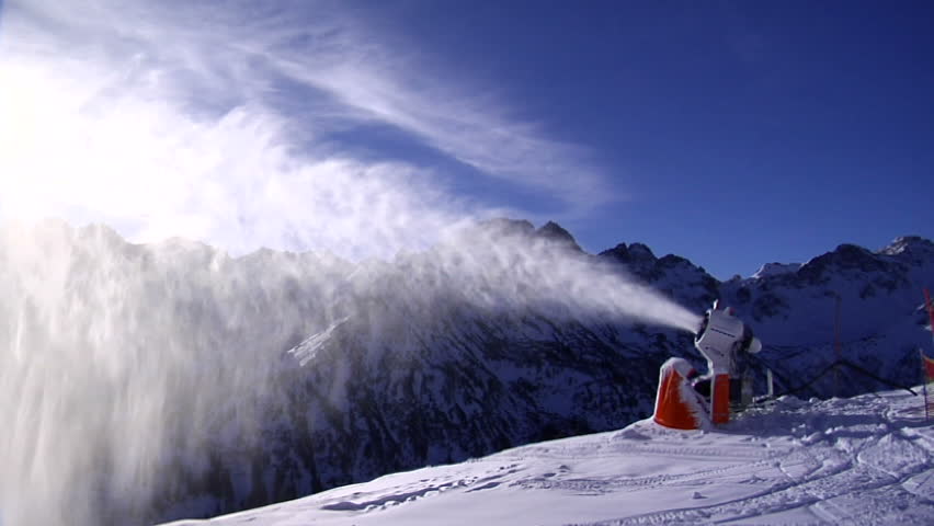 Snowgun making artificial snow in the Alps