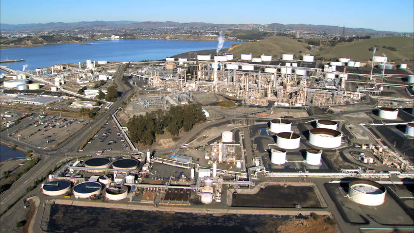 Aerial view flying over an oil refinery on the coastline of San Francisco