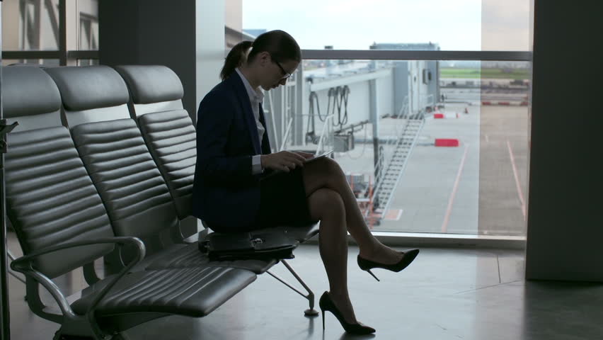 Business Lady Sitting In The Dark Waiting Room