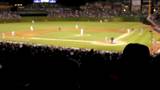 Clapping crowd at baseball game, silhouette
