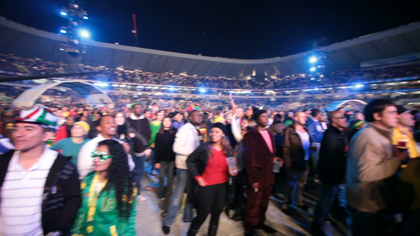 SOWETO - JUNE 10: Fans watches international performers at Orlando Stadium for the FIFA World Cup Kick Off Celebration Concert on June 10, 2010 in Soweto.