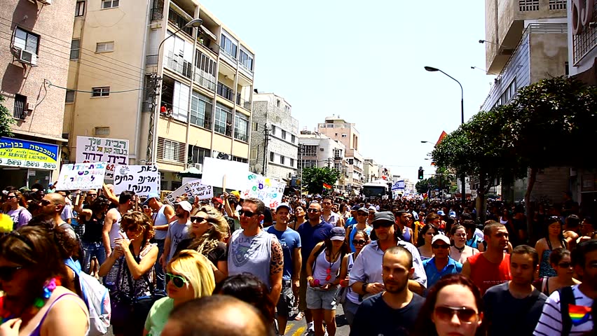 TEL AVIV, ISRAEL - JUNE 11: Participants in the 10th Annual Pride Parade marching through the streets in Tel Aviv, Israel, June 11, 2010