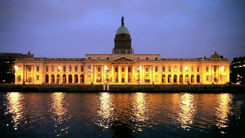 The Custom House in Dublin at night, observed across the river Liffey